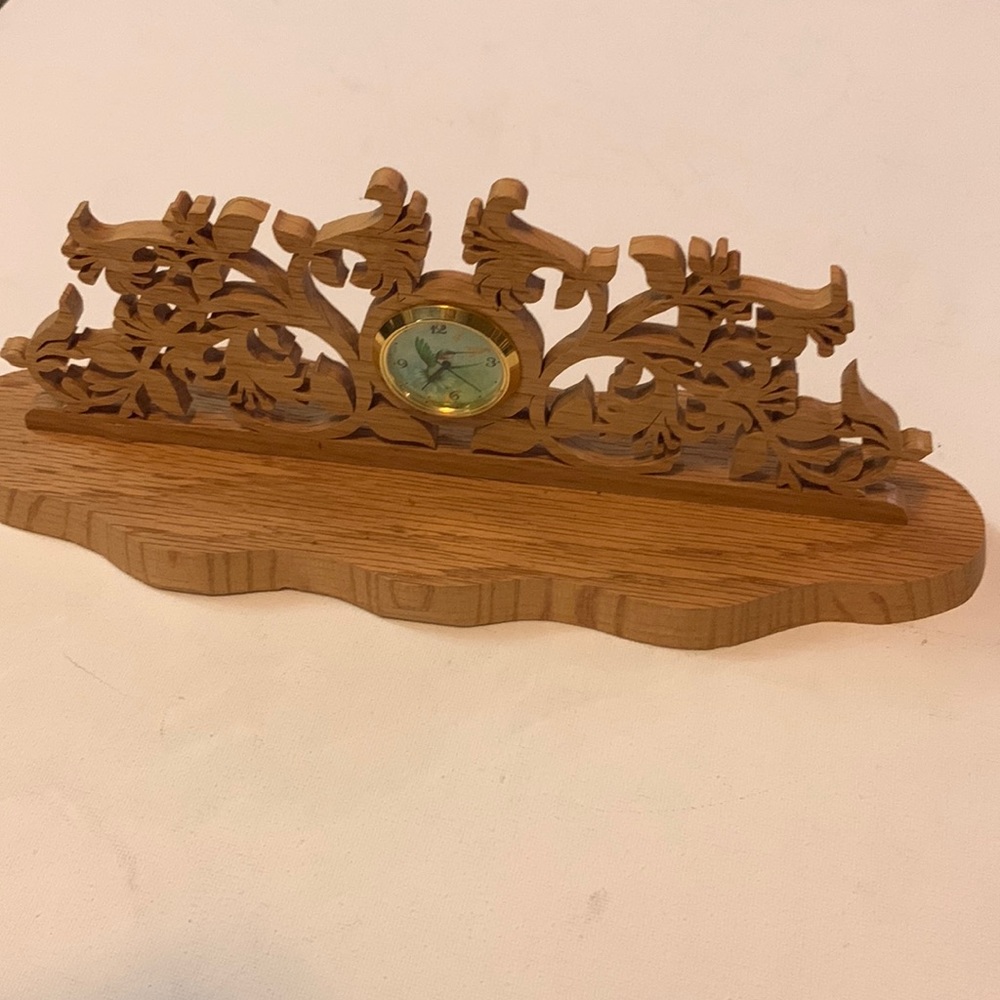 Lovely intricate handmade  scroll work floral base with hummingbird clock